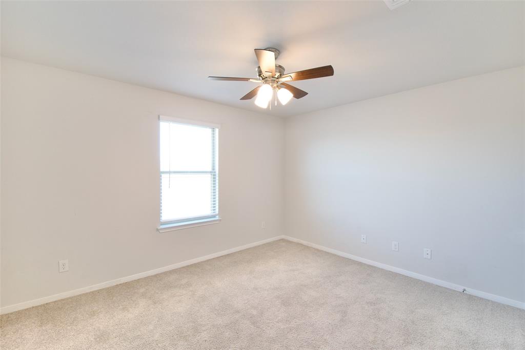 11229 Solar Street Lorena, TX 76655 - Photo 27 of 34 Unfurnished room featuring light colored carpet and ceiling fan