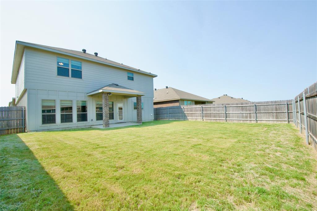 11229 Solar Street Lorena, TX 76655 - Photo 34 of 34 Back of property featuring a fenced backyard