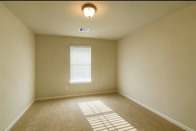 an empty room with a window
