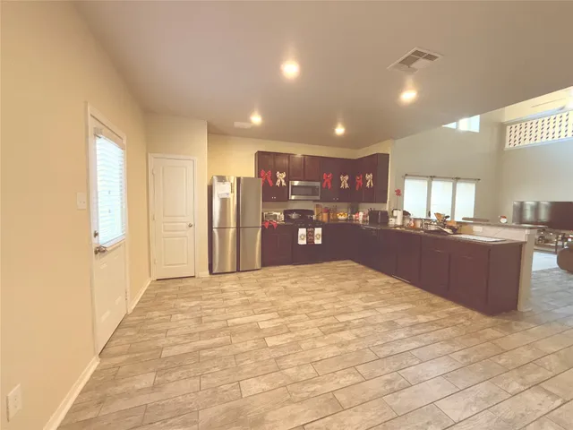 a large bathroom with a sink and a large mirror