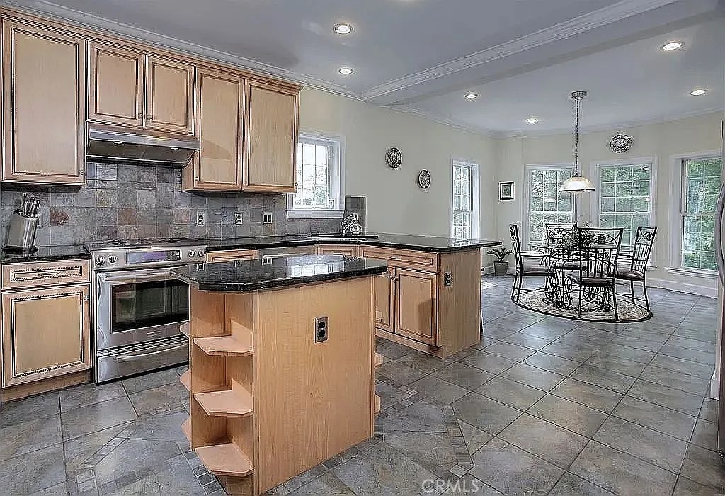 26 Anderson Hill Road Bernardsville, NJ 07924 - Photo 3 of 16 a kitchen with stainless steel appliances granite countertop a sink stove and cabinets