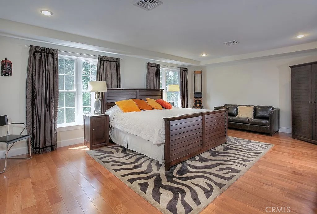 26 Anderson Hill Road Bernardsville, NJ 07924 - Photo 10 of 16 a bedroom with furniture and wooden floor