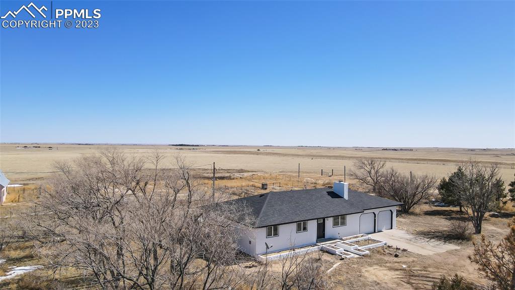 2975 North Ramah Highway Yoder, CO 80864 - Photo 30 of 43 a view of a terrace with a lake view