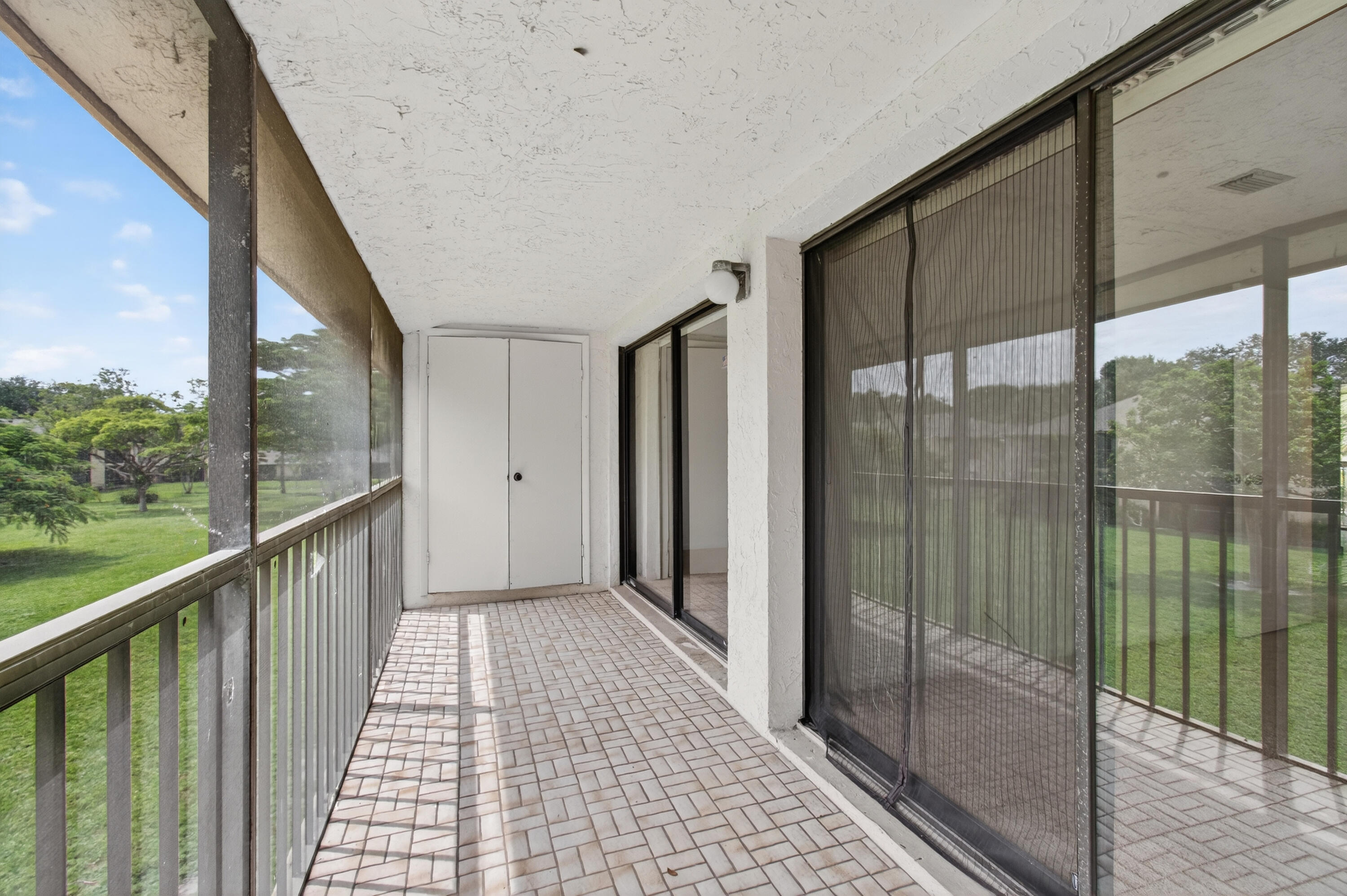 3939 Northeast 5th Avenue, Unit C203 Boca Raton, FL 33431 - Photo 26 of 30 a view of a city from a balcony