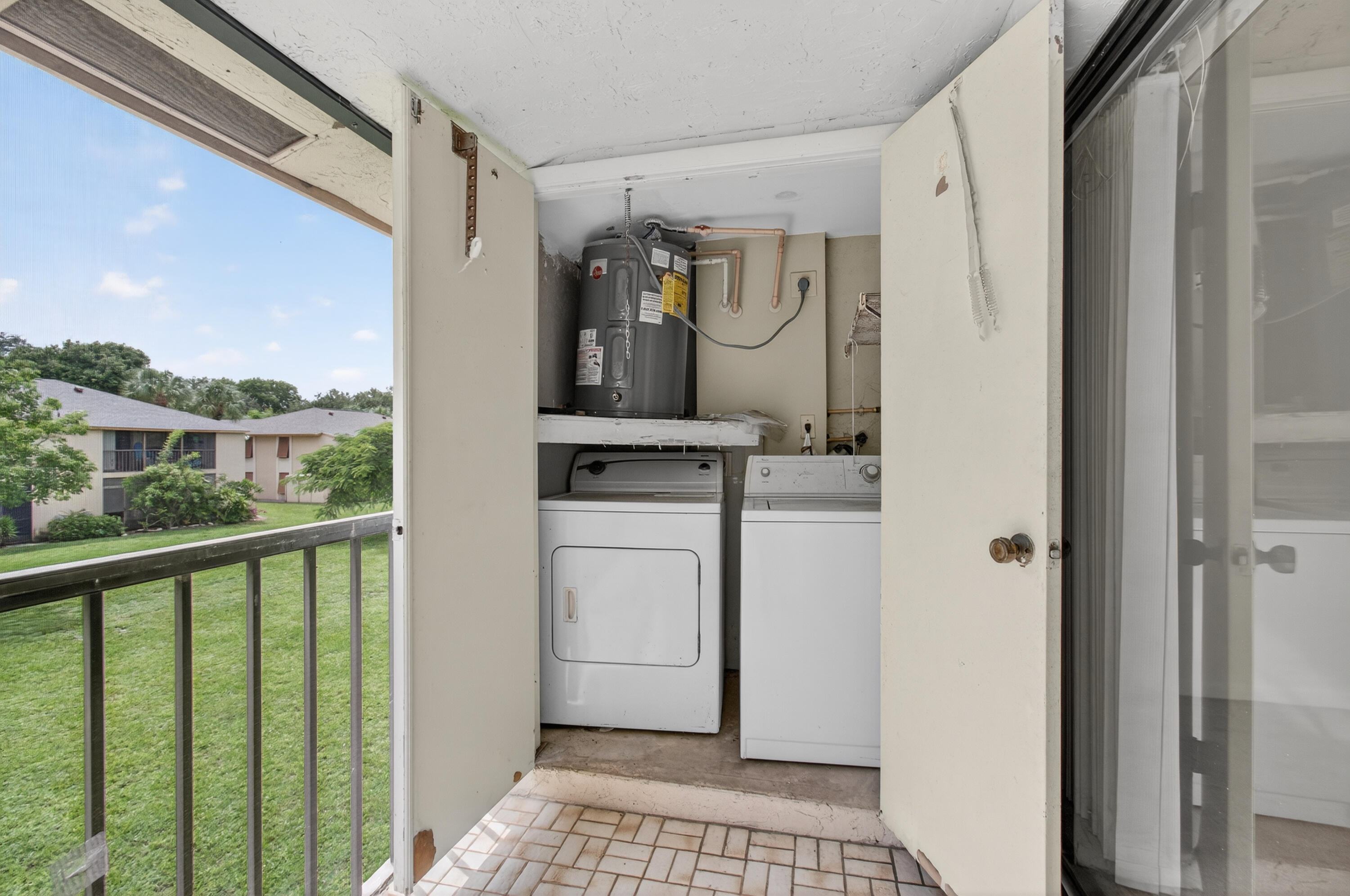 3939 Northeast 5th Avenue, Unit C203 Boca Raton, FL 33431 - Photo 27 of 30 a view of a walk in closet
