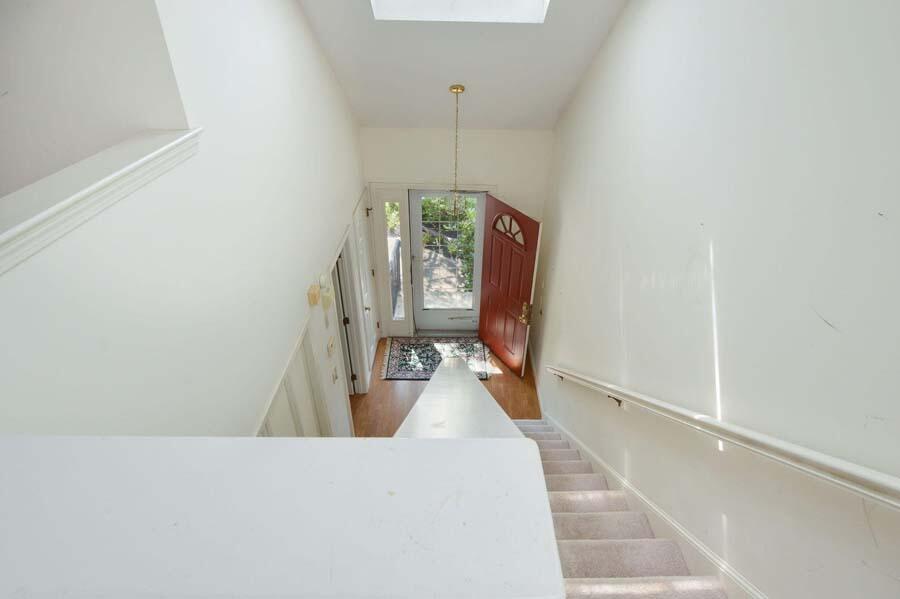 3 Kettle Lane Mashpee, MA 02649 - Photo 17 of 27 a hallway with a large window in living room