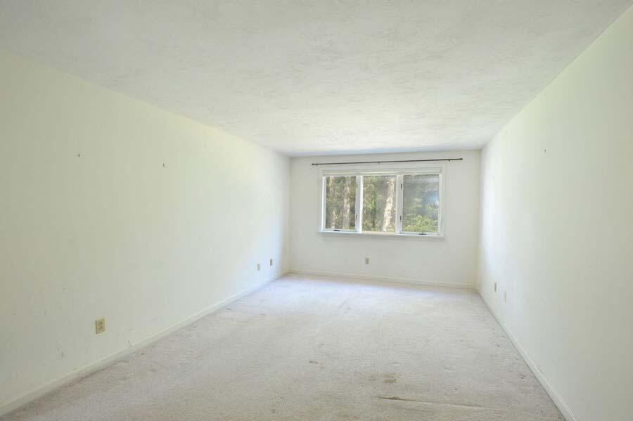 3 Kettle Lane Mashpee, MA 02649 - Photo 20 of 27 an empty room with windows
