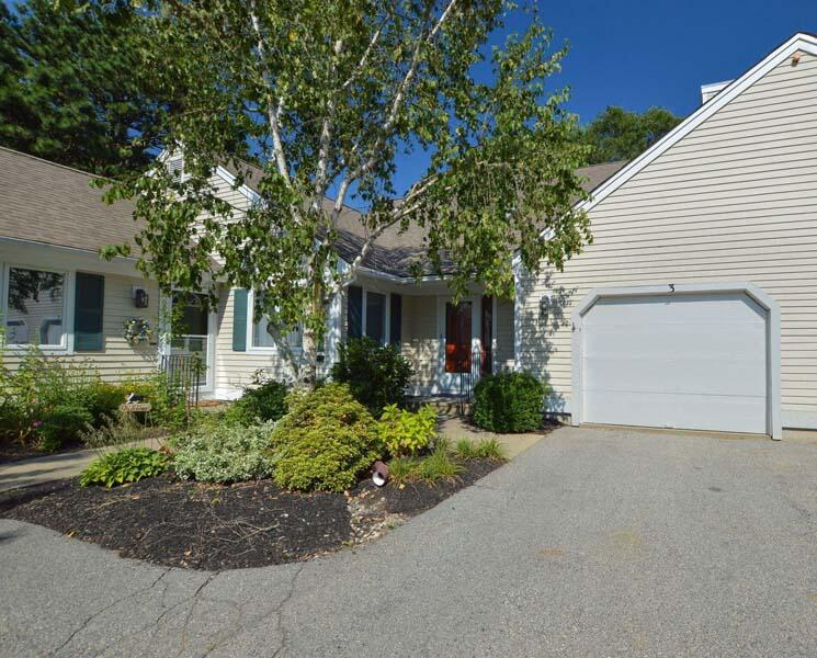 3 Kettle Lane Mashpee, MA 02649 - Photo 2 of 27 a front view of a house with a garden