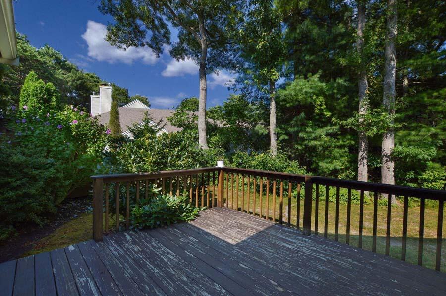 3 Kettle Lane Mashpee, MA 02649 - Photo 6 of 27 a view of a wooden bridge