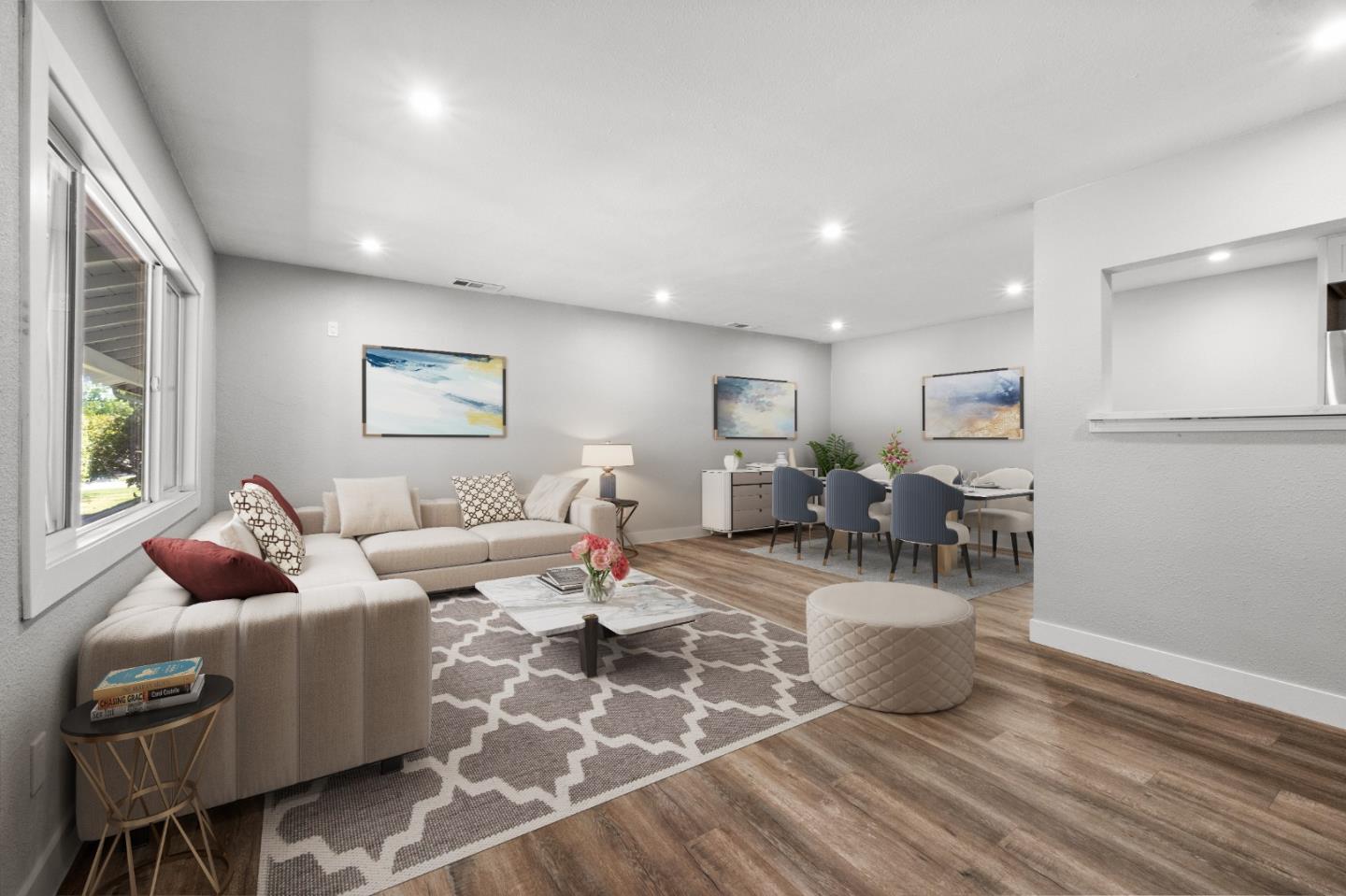 212 East Longview Avenue Stockton, CA 95207 - Photo 2 of 34 a living room with lots of furniture and a wooden floor