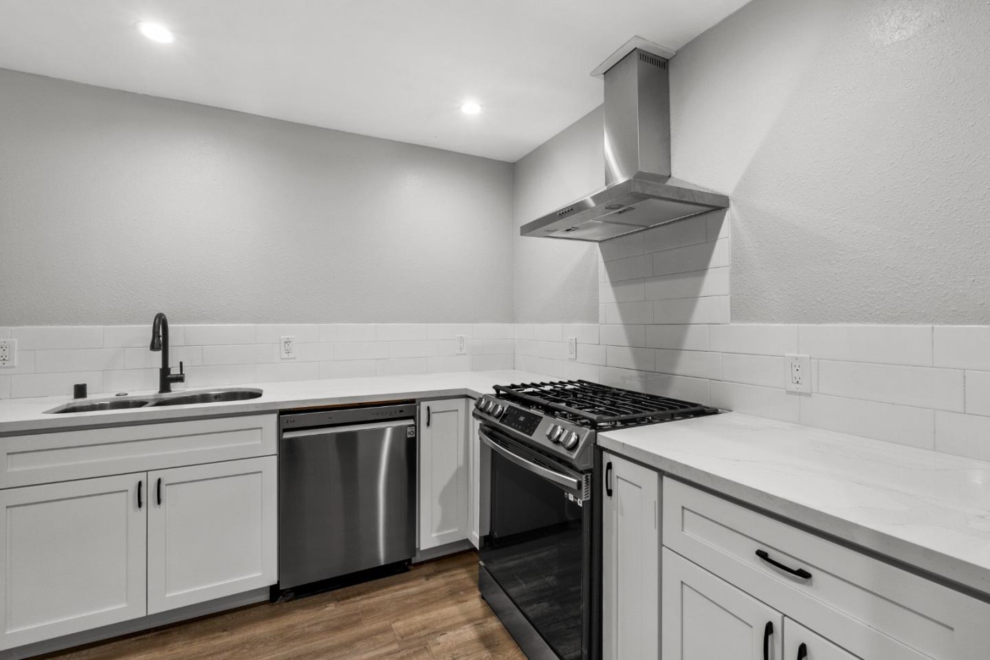 212 East Longview Avenue Stockton, CA 95207 - Photo 5 of 34 a kitchen with cabinets and appliances