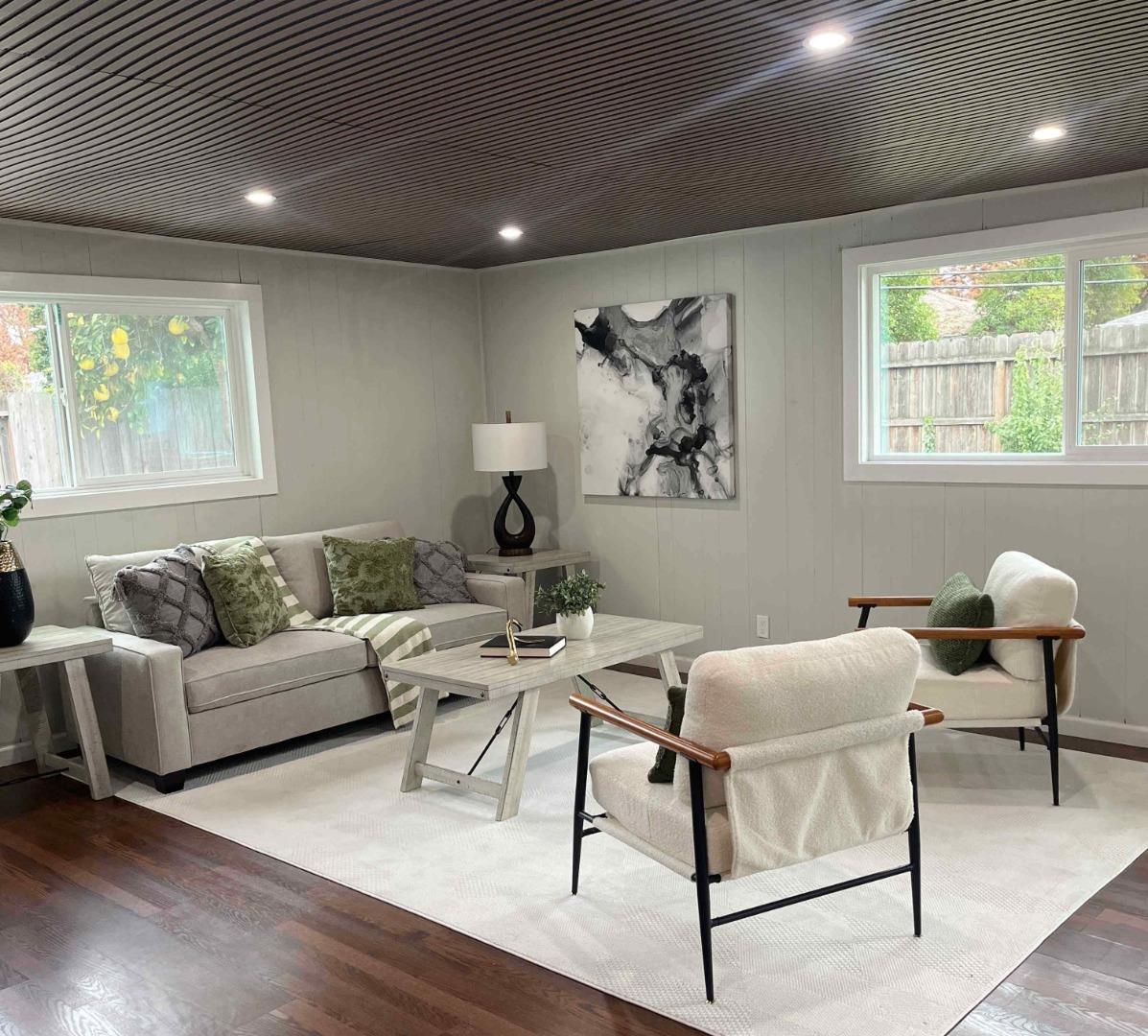 212 East Longview Avenue Stockton, CA 95207 - Photo 10 of 34 a living room with furniture and a large window