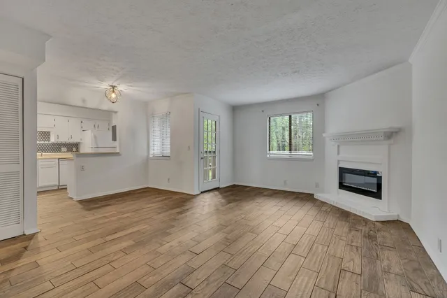 a view of kitchen with wooden floor