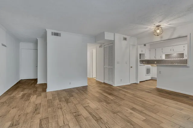 a bathroom with a toilet a sink and bathtub