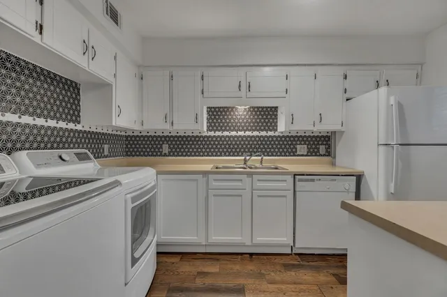 a bathroom with a toilet and a bathtub