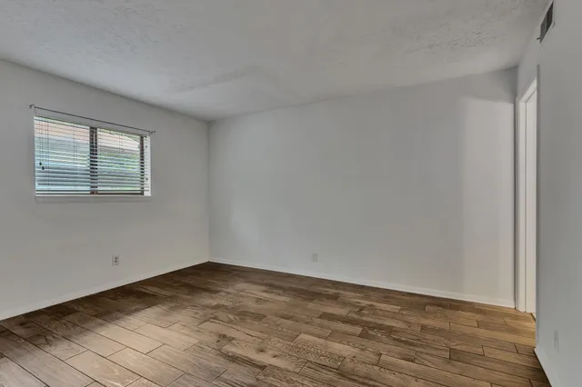 a bathroom with a toilet and a bathtub