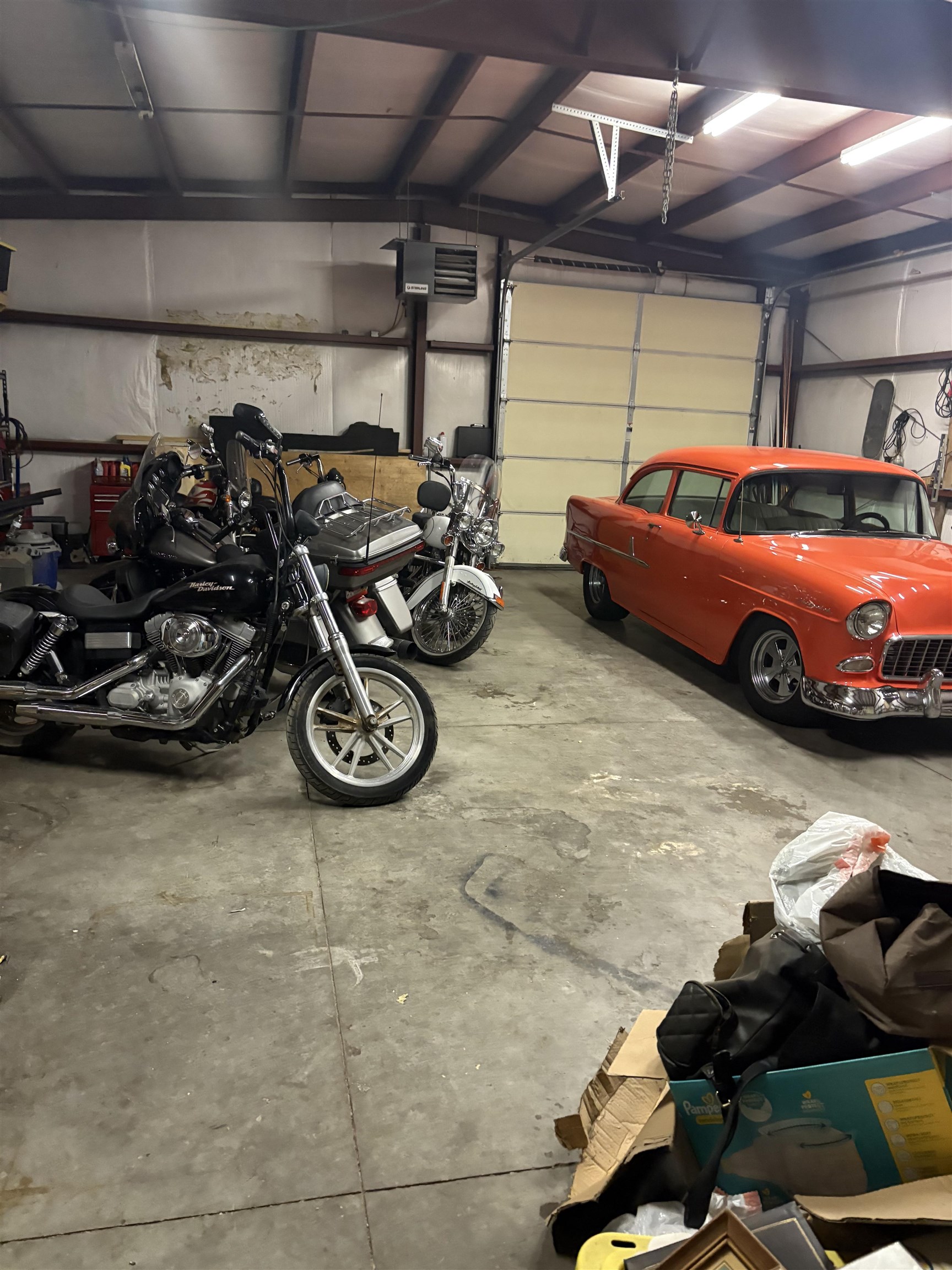 208 3rd Street Parachute, CO 81635 - Photo 31 of 40 a car parked in garage