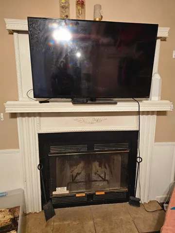 a stove top oven sitting inside of a kitchen