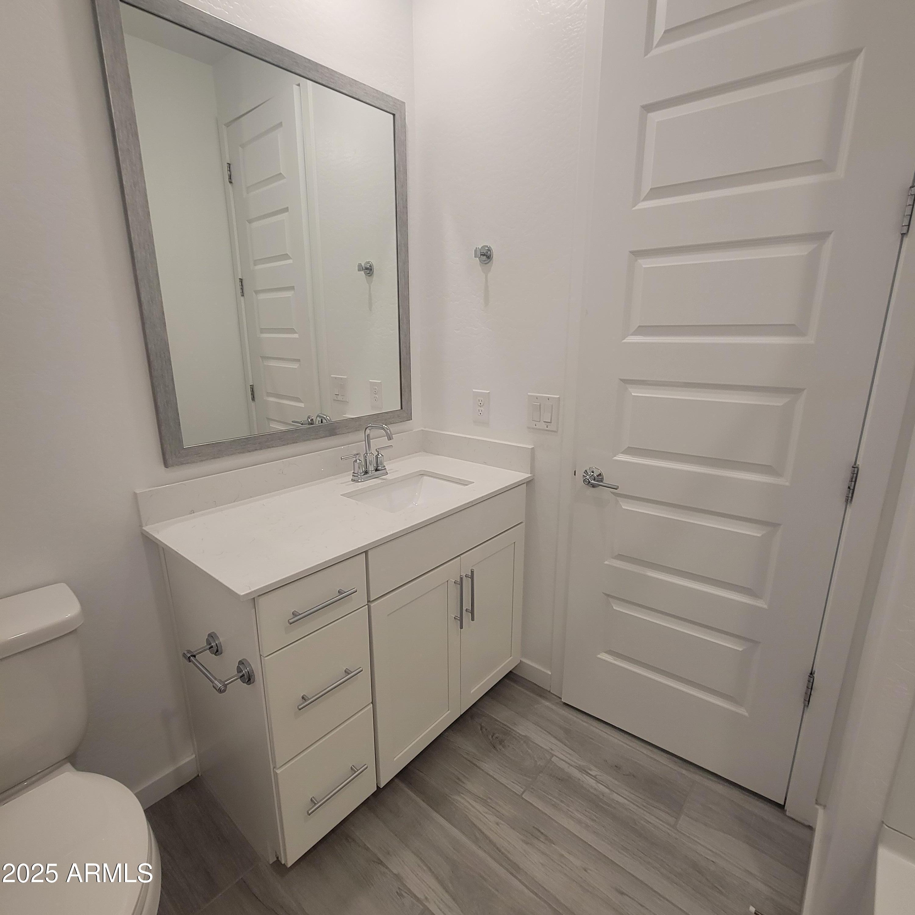 4077 South Sabrina Drive, Unit 30 Chandler, AZ 85248 - Photo 16 of 37 a bathroom with a sink and a mirror