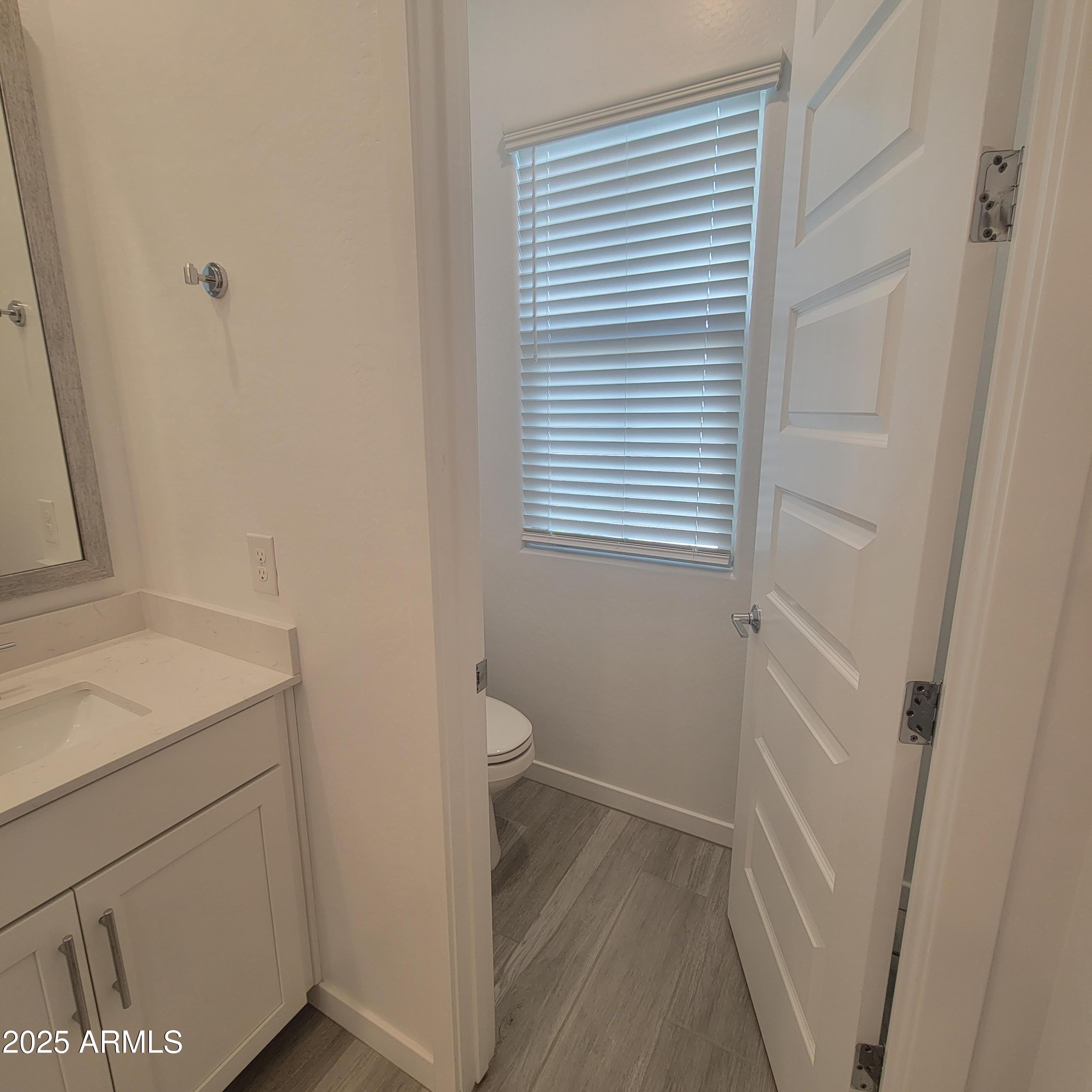 4077 South Sabrina Drive, Unit 30 Chandler, AZ 85248 - Photo 19 of 37 a bathroom with a sink and a toilet