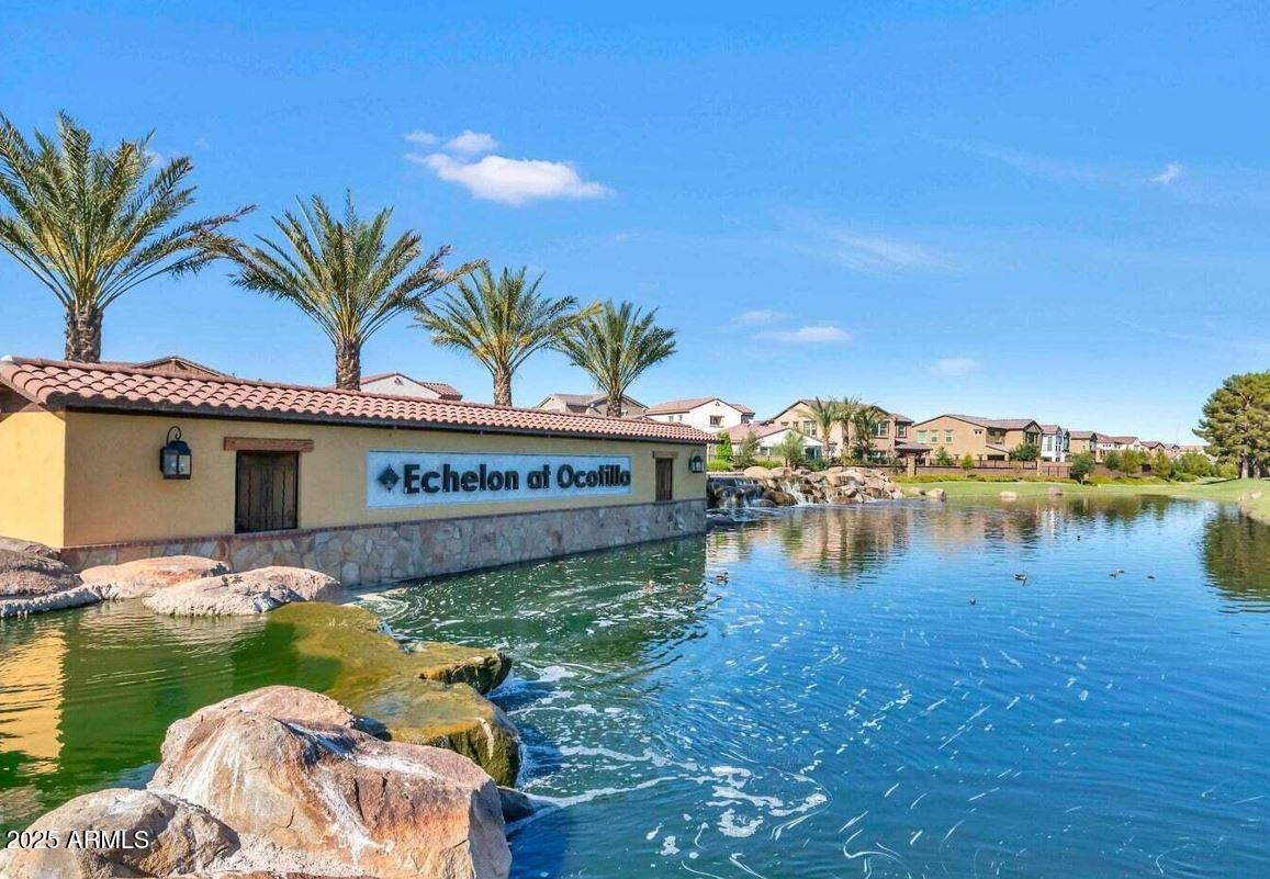 4077 South Sabrina Drive, Unit 30 Chandler, AZ 85248 - Photo 33 of 37 a view of a house with pool and a yard