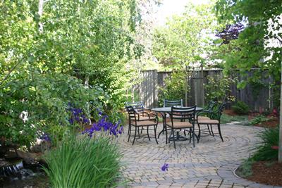 38 Moore Road Novato, CA 94949 - Photo 5 of 11 Spiral pattern brick paver patio on the stream
