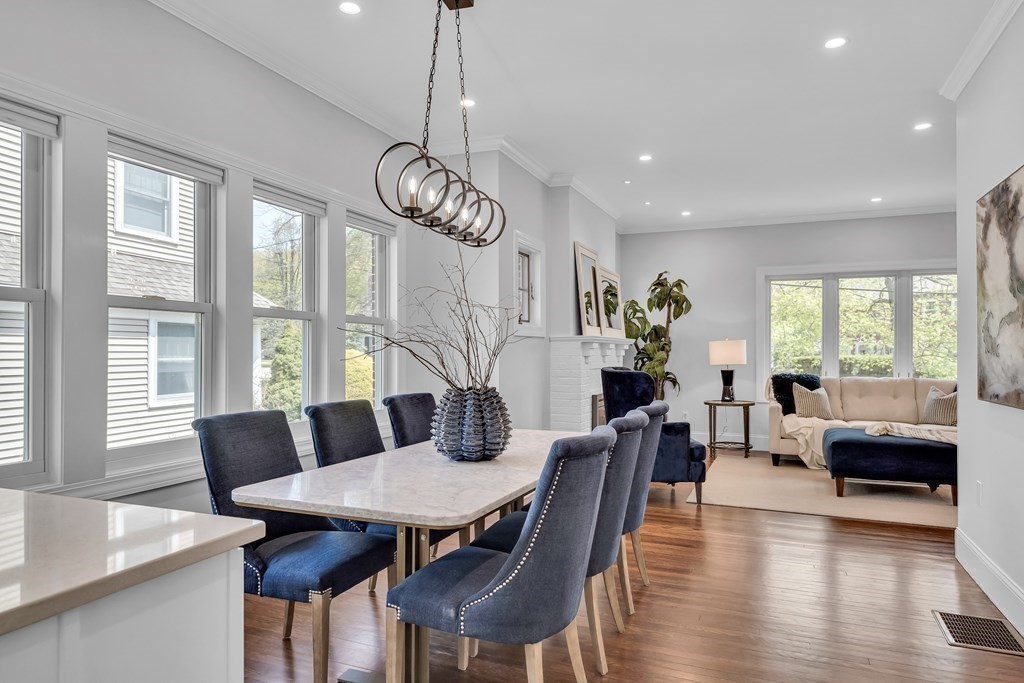6 Regent Road Belmont, MA 02478 - Photo 11 of 29 a view of a dining room with furniture wooden floor and chandelier