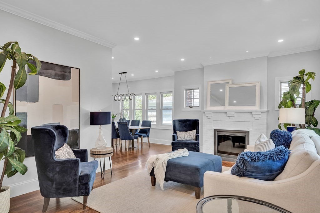 6 Regent Road Belmont, MA 02478 - Photo 3 of 29 a living room with furniture fireplace and dining table
