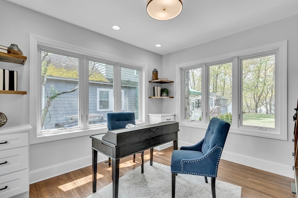 6 Regent Road Belmont, MA 02478 - Photo 8 of 29 a view of a workspace with furniture and a window
