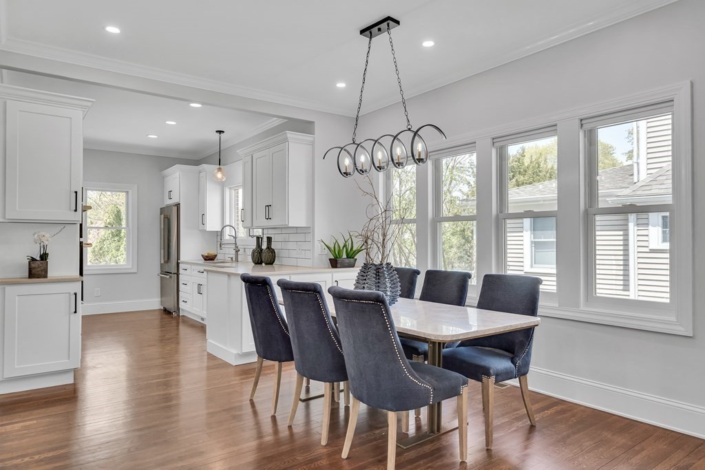 6 Regent Road Belmont, MA 02478 - Photo 10 of 29 a view of a dining room with furniture window and wooden floor