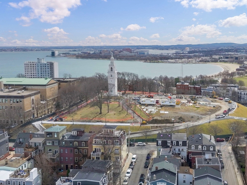 58 Telegraph Street, Unit 2 Boston, MA 02127 - Photo 15 of 17 a view of a swimming pool with an ocean view