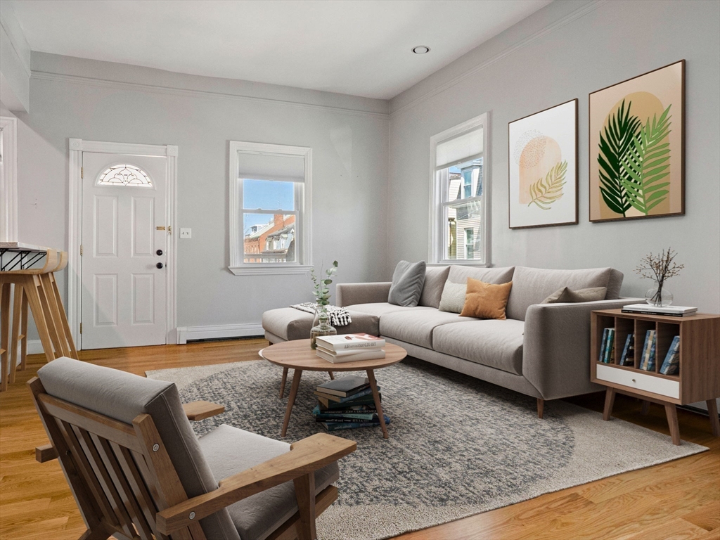 58 Telegraph Street, Unit 2 Boston, MA 02127 - Photo 4 of 17 a living room with furniture and a wooden floor