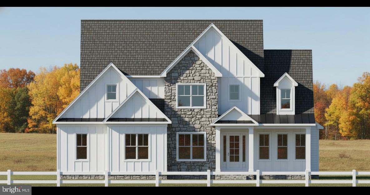 a view of a house with wooden fence