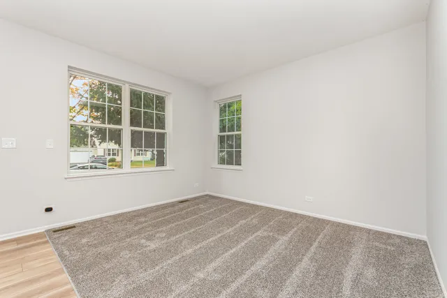 a view of a bedroom with a window