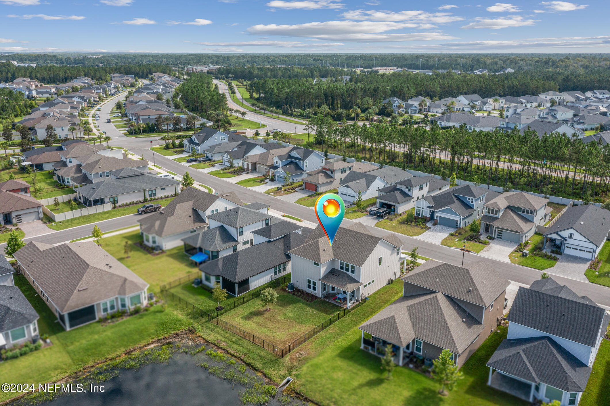 10020 Invention Lane Jacksonville, FL 32256 - Photo 62 of 87 an aerial view of a house with a garden