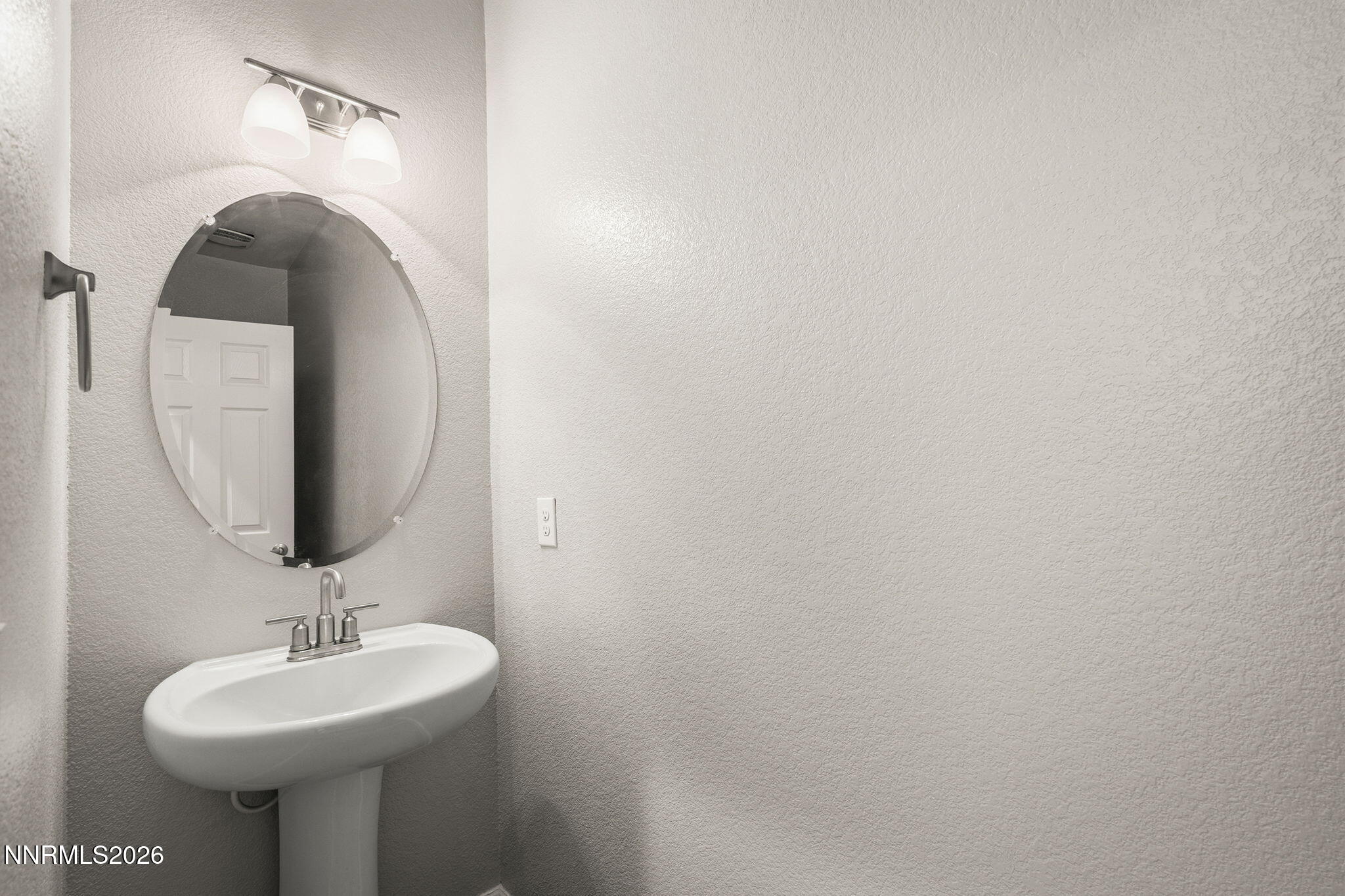 14138 Glowing Amber Court Reno, NV 89511 - Photo 29 of 36 a bathroom with a sink and a mirror