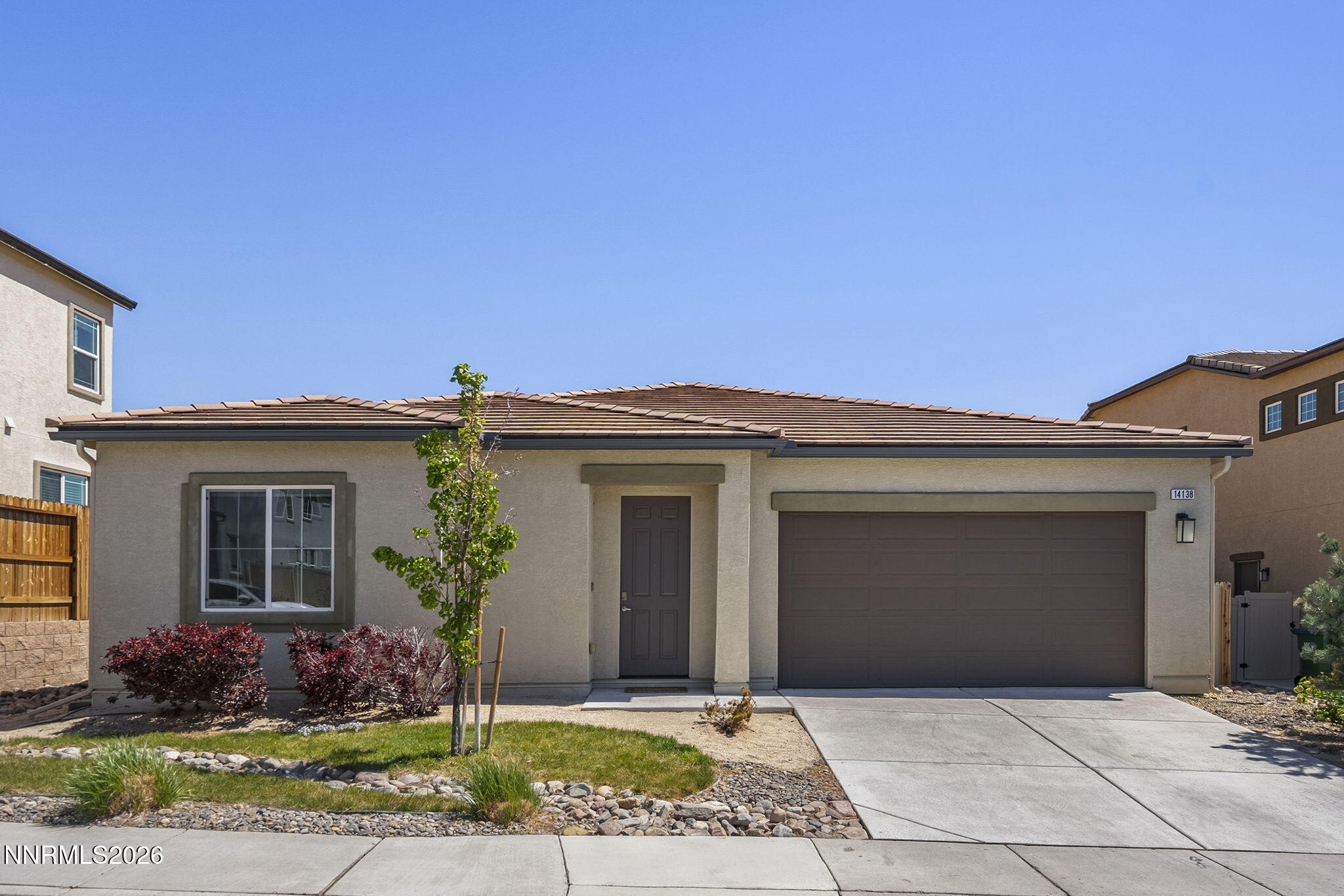 14138 Glowing Amber Court Reno, NV 89511 - Photo 36 of 36 a front view of a house with a yard