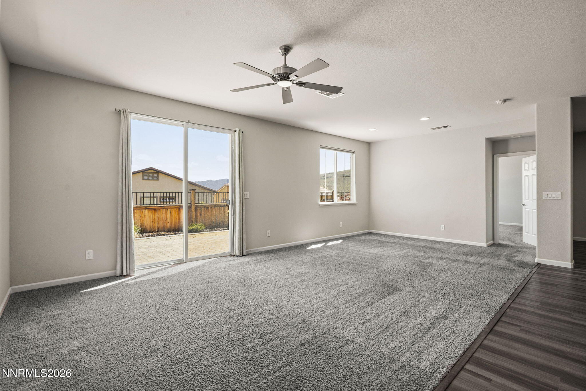 14138 Glowing Amber Court Reno, NV 89511 - Photo 10 of 36 a view of an empty room with a window