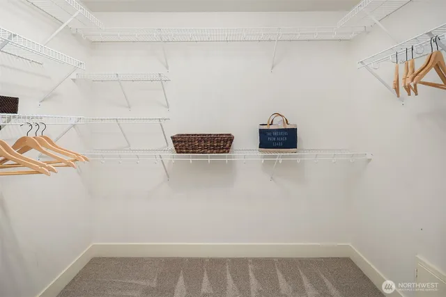 a view of storage and utility room with empty racks