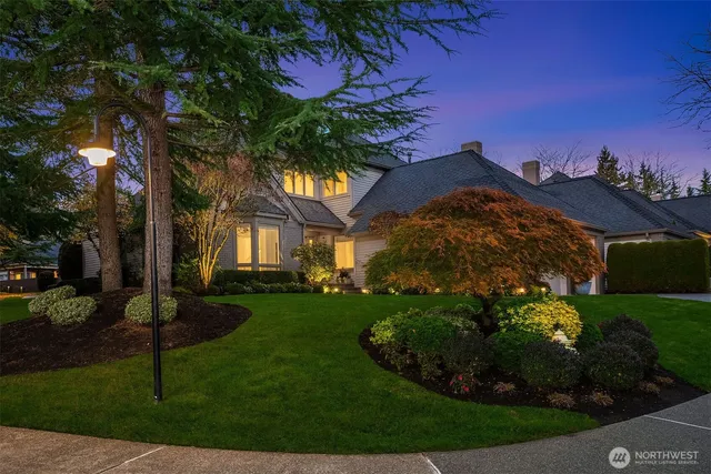 a view of a street with a building in the background