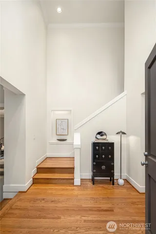 a view of a hallway with front door