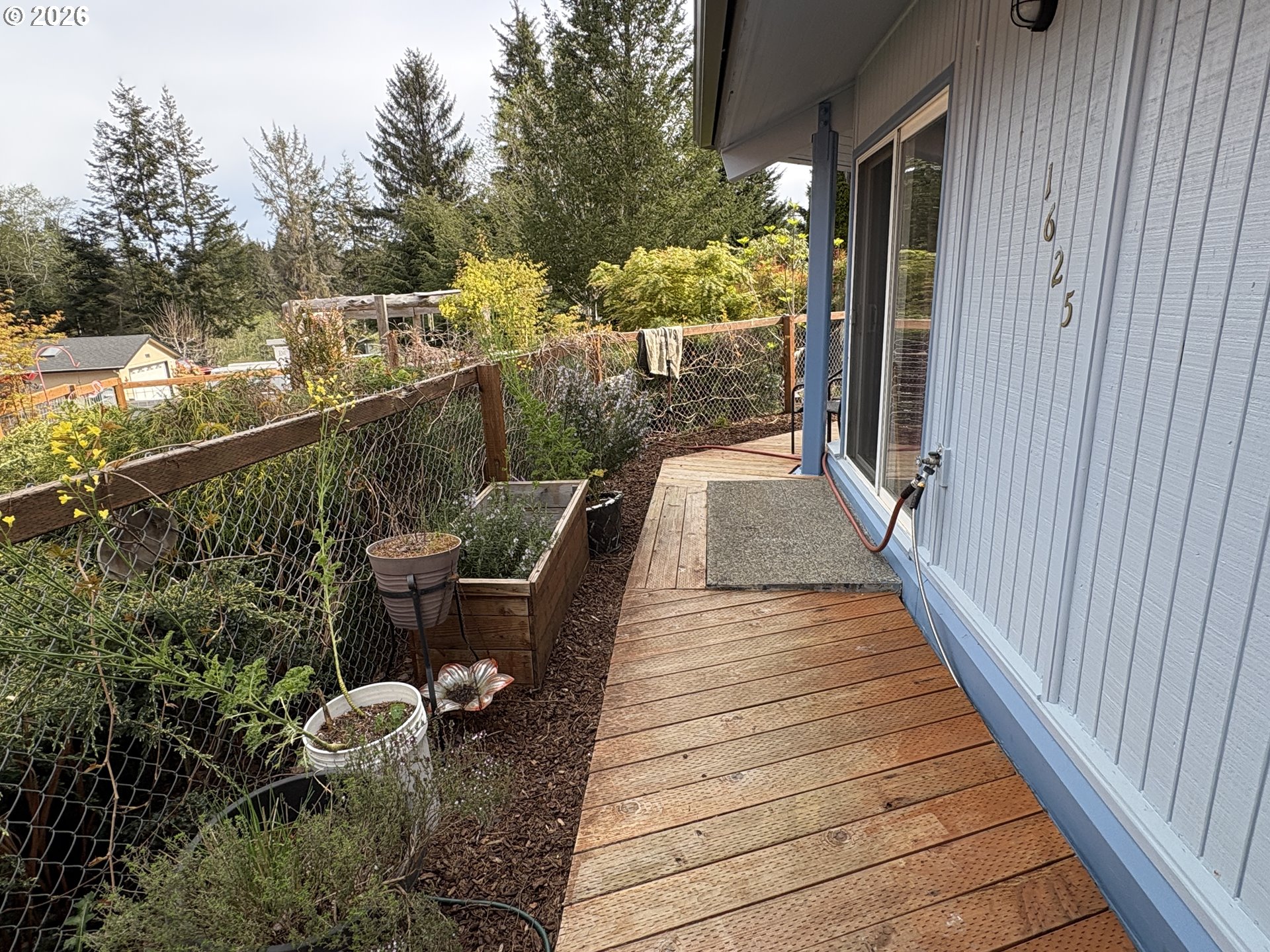 1625 Kristi Loop Lakeside, OR 97449 - Photo 5 of 41 a view of balcony and deck