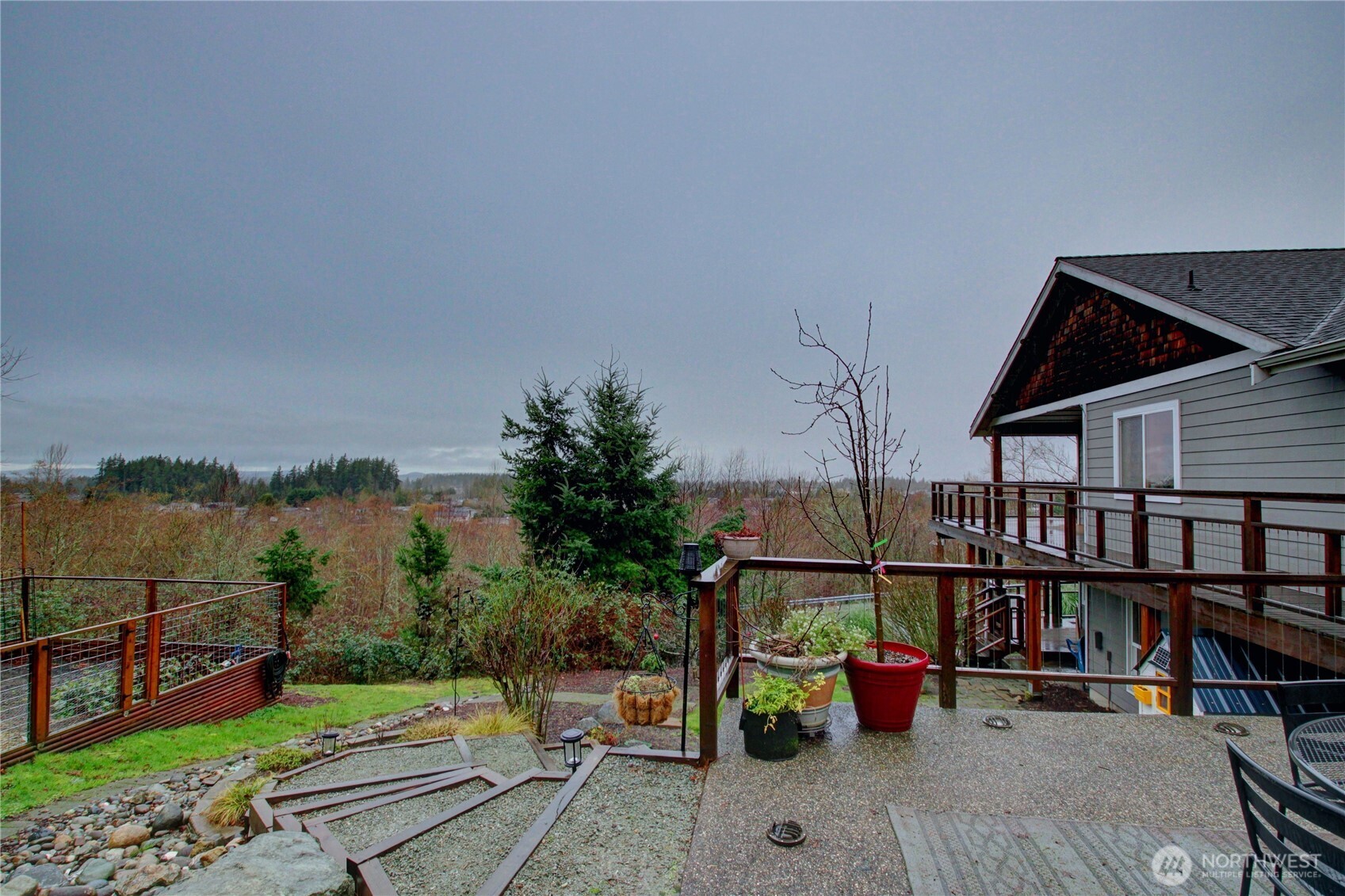 3200 Shelly Hill Road Mount Vernon, WA 98274 - Photo 29 of 39 a backyard of a house with seating space and lake view