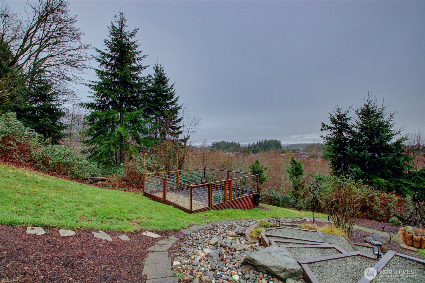 3200 Shelly Hill Road Mount Vernon, WA 98274 - Photo 30 of 39 a view of a garden with a building in the background