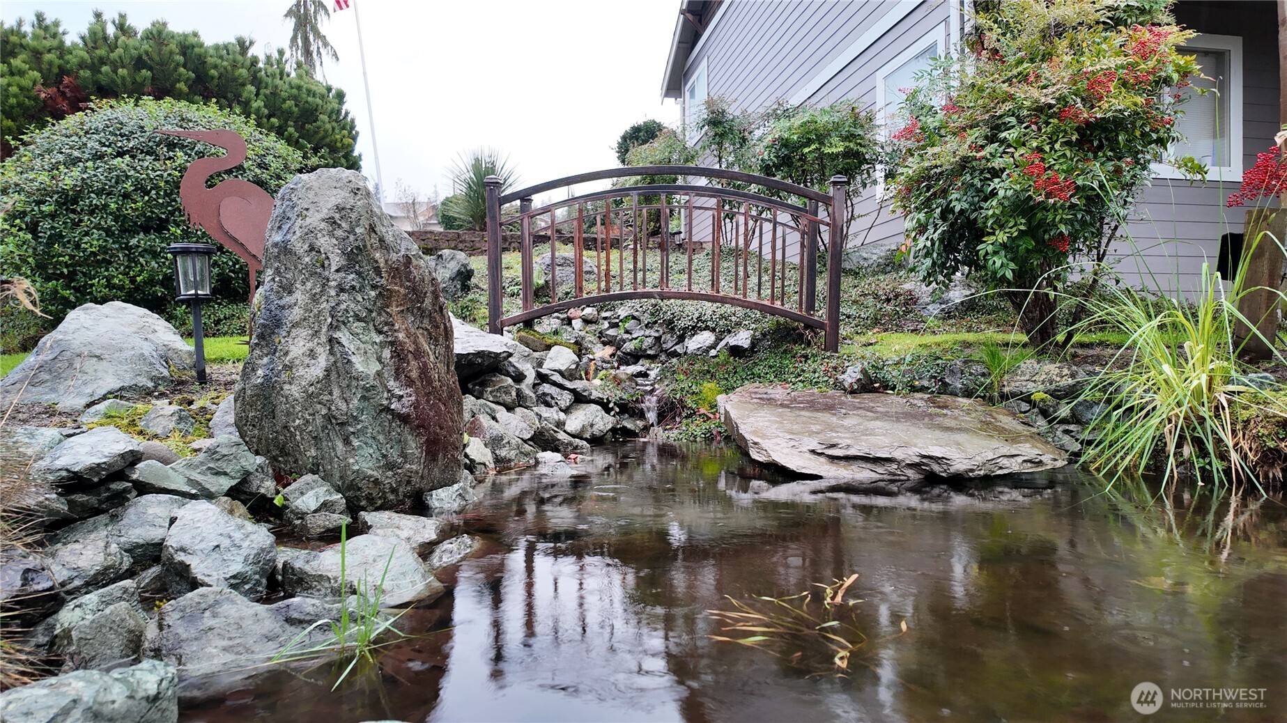 3200 Shelly Hill Road Mount Vernon, WA 98274 - Photo 33 of 39 a view of a lake with a building in the background