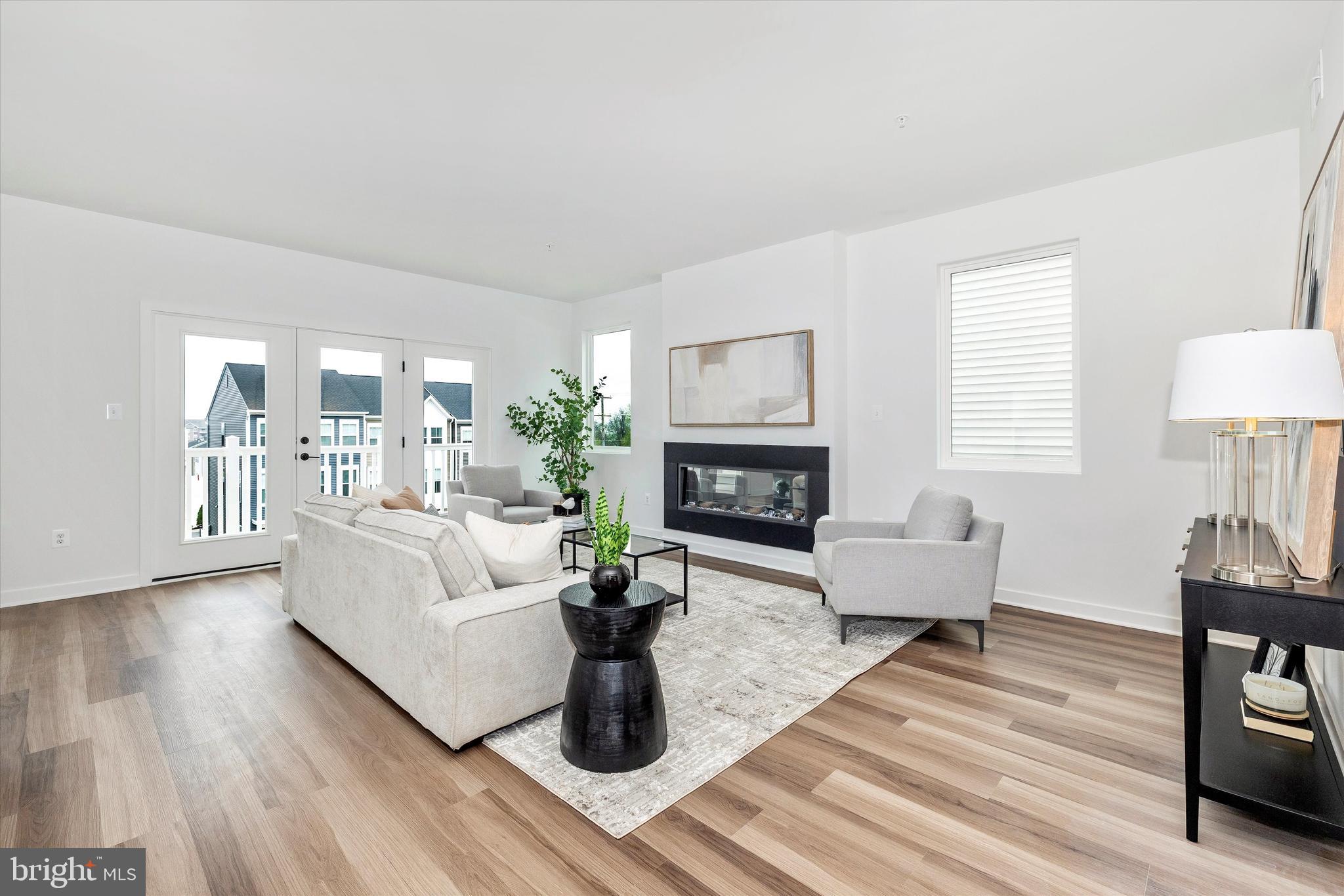 709 B Iron Frg Road Frederick, MD 21702 - Photo 13 of 32 a living room with furniture and a fireplace