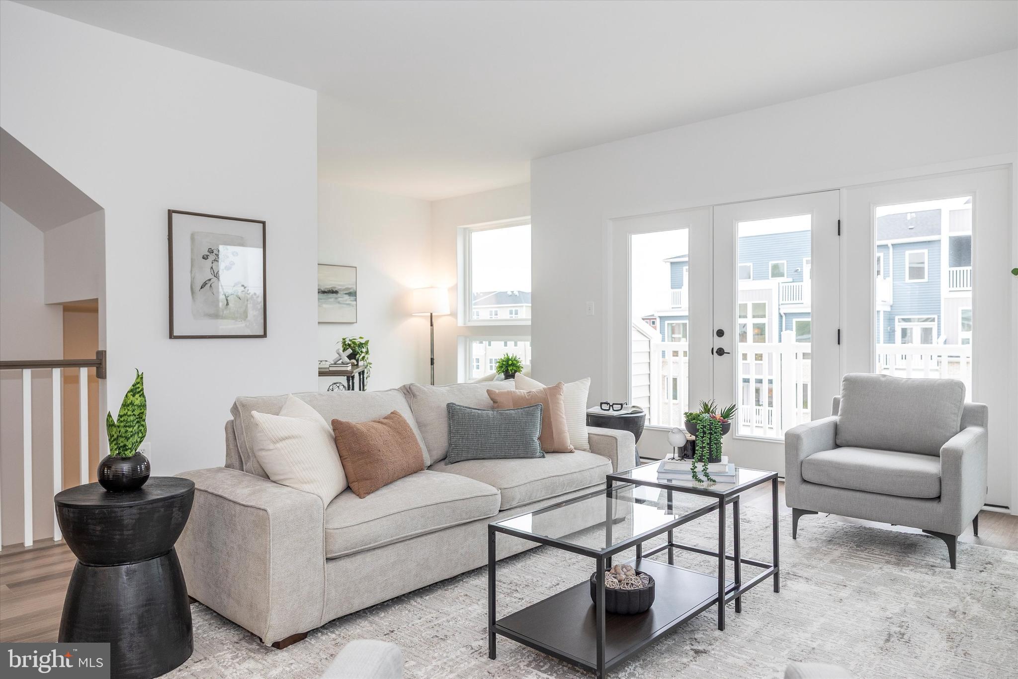 709 B Iron Frg Road Frederick, MD 21702 - Photo 14 of 32 a living room with furniture and a potted plant