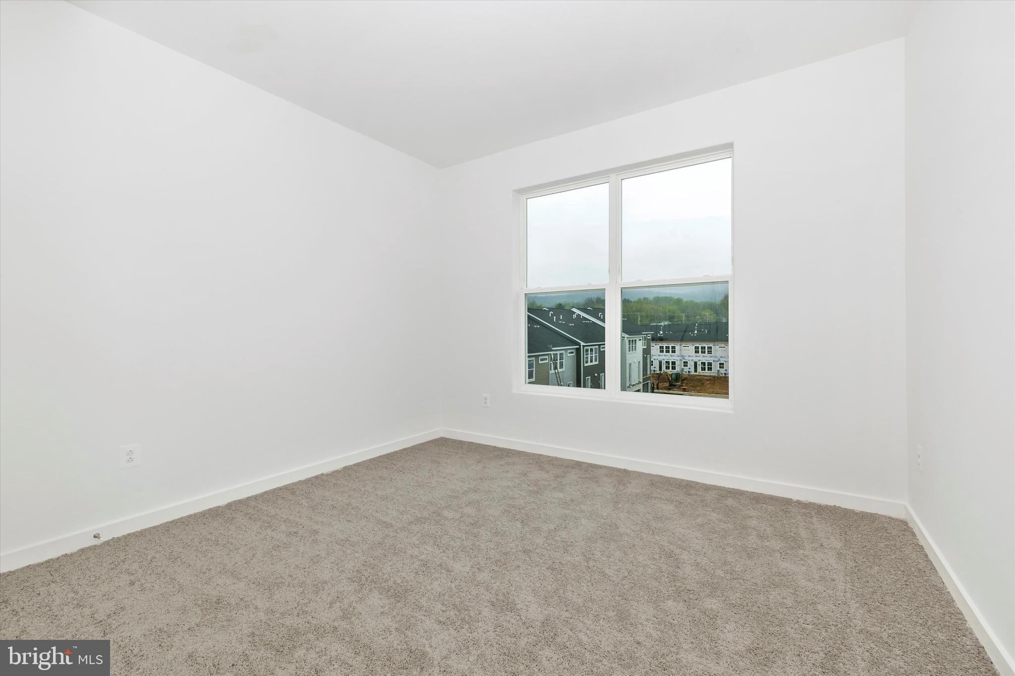 709 B Iron Frg Road Frederick, MD 21702 - Photo 26 of 32 an empty room with a window