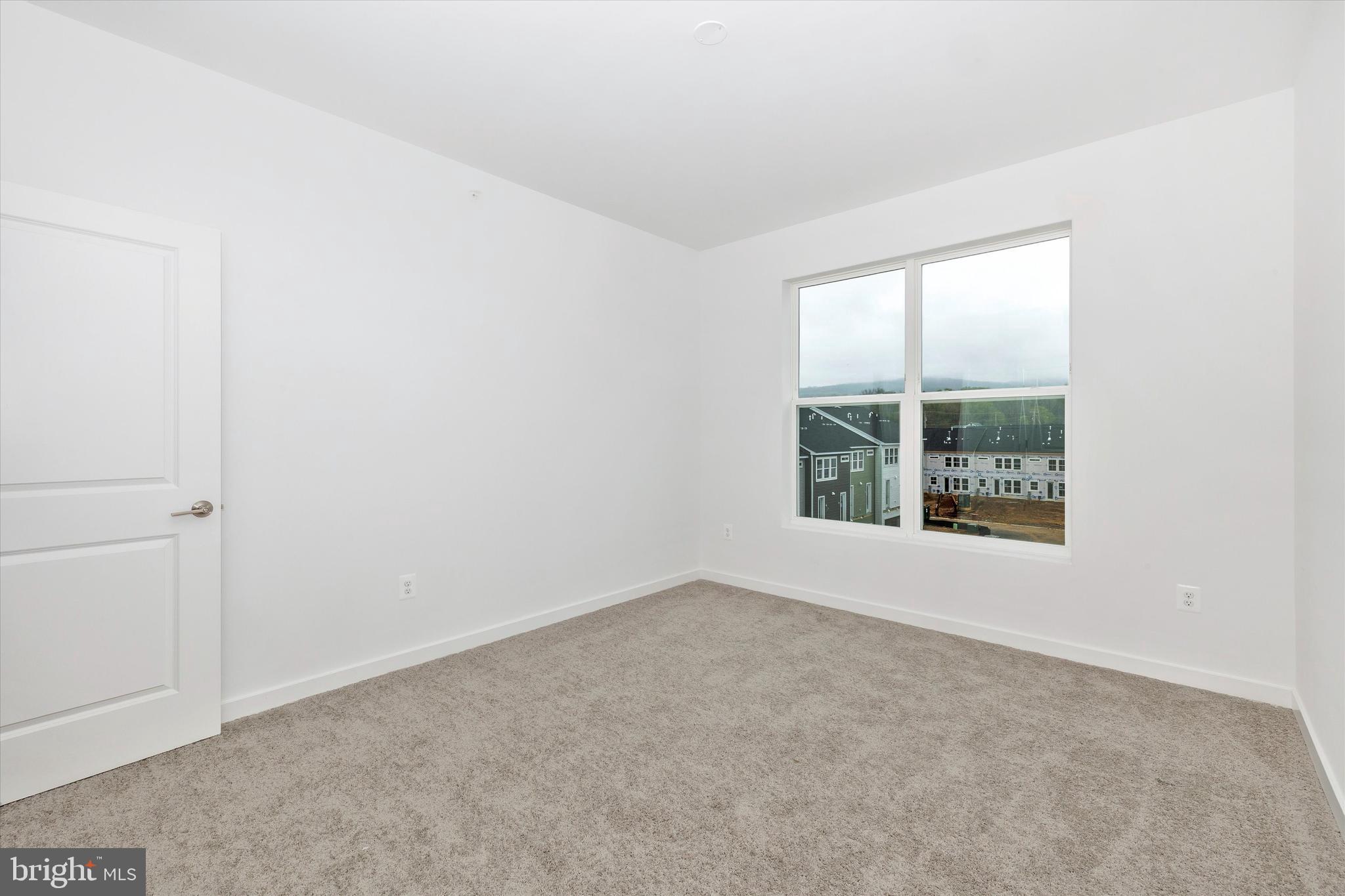 709 B Iron Frg Road Frederick, MD 21702 - Photo 28 of 32 an empty room with a window