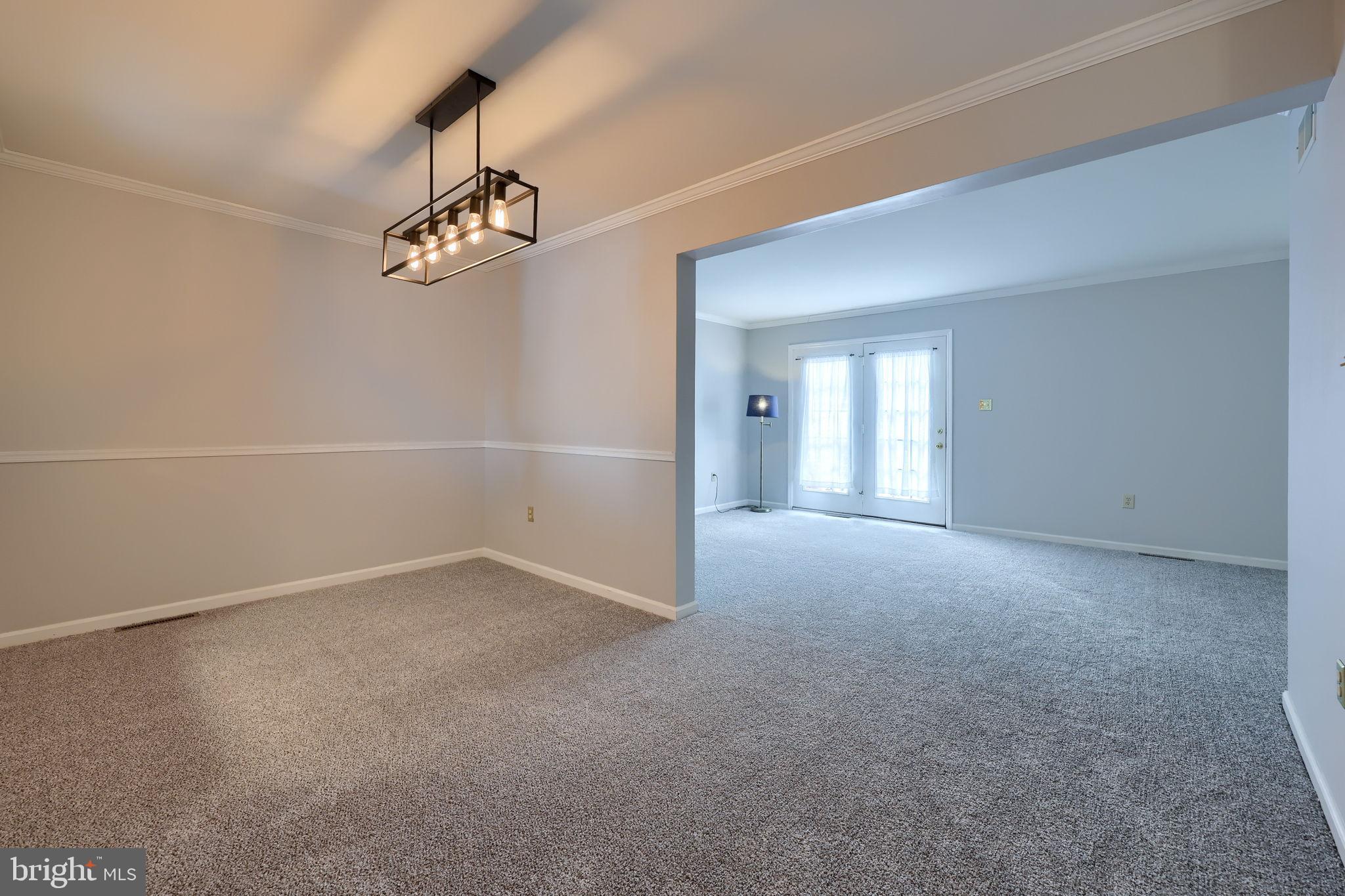 2904 Newport Way Reading, PA 19608 - Photo 12 of 35 Spacious dining room open to living area.